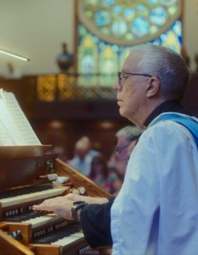 Andrew Walker playing a pipe organ