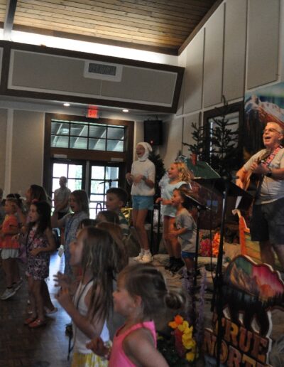 Andrew Walker leading a children's singing workshop