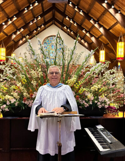 Andrew Walker Conducting a choir