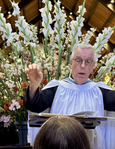 Andrew Walker Conducting a choir