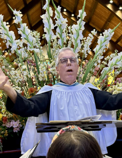 Andrew Walker Conducting a choir