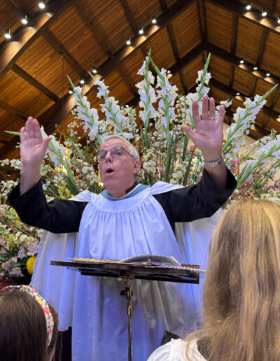 Andrew Walker Conducting a choir